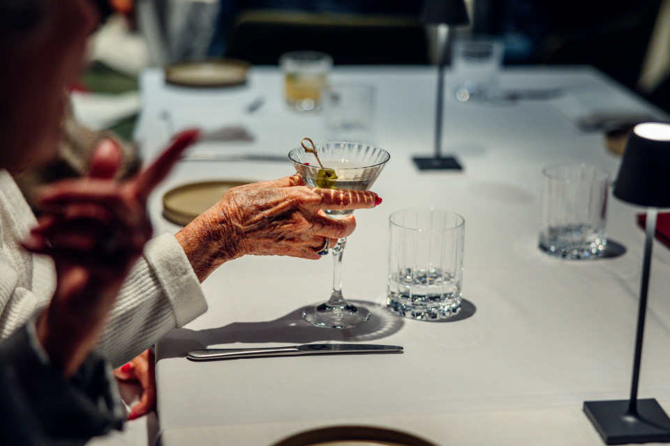 Elderly woman with cocktail peace sign — The Junction Stouffville case study
