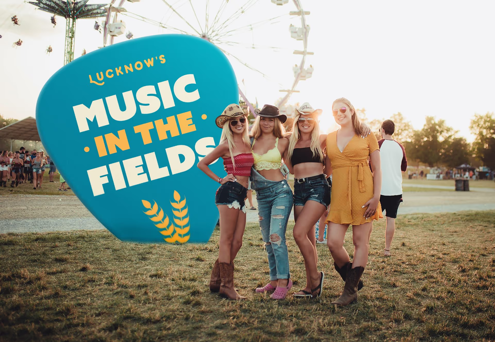 mlitf women next to the festival sign — Lucknow Music In The Fields case study